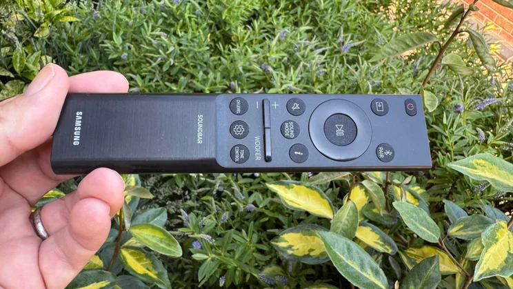An image of the remote control included with the Samsung HW-Q990F home audio system