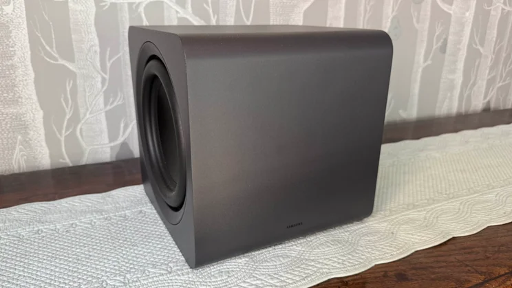 The subwoofer component of the Samsung HW-Q990F home audio system pictured from the right-hand side