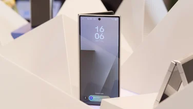 The Samsung Galaxy Fold 7 pictured partially open on a white plinth
