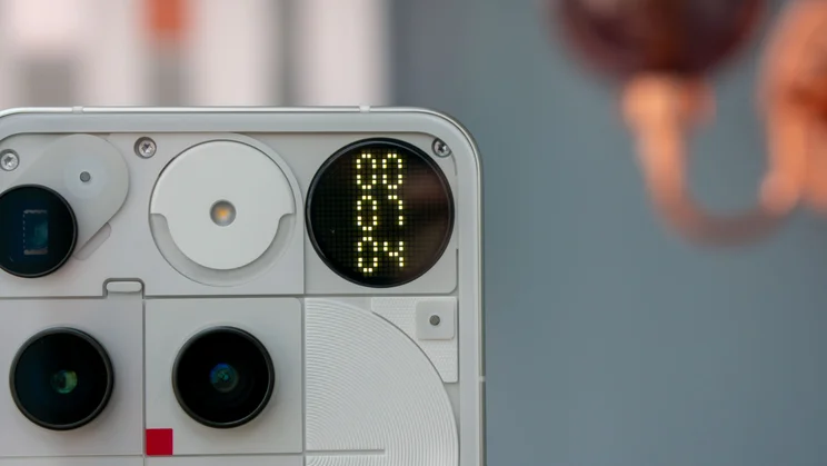 Nothing Phone (3)'s rear Glyph Matrix interface showing a stopwatch