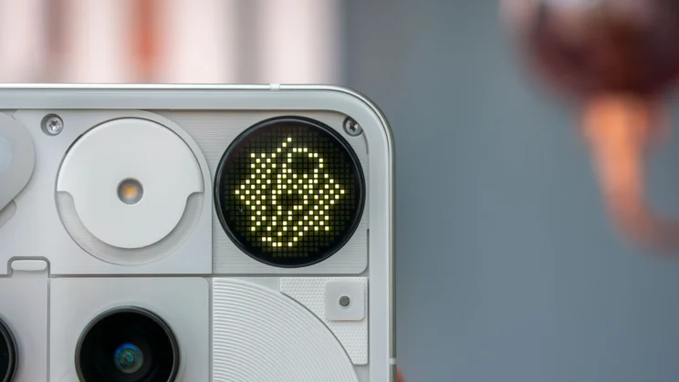 Nothing Phone (3)'s rear Glyph Matrix interface showing a game of spin the bottle