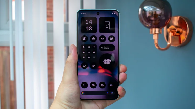 Nothing Phone (3) in hand with the display on