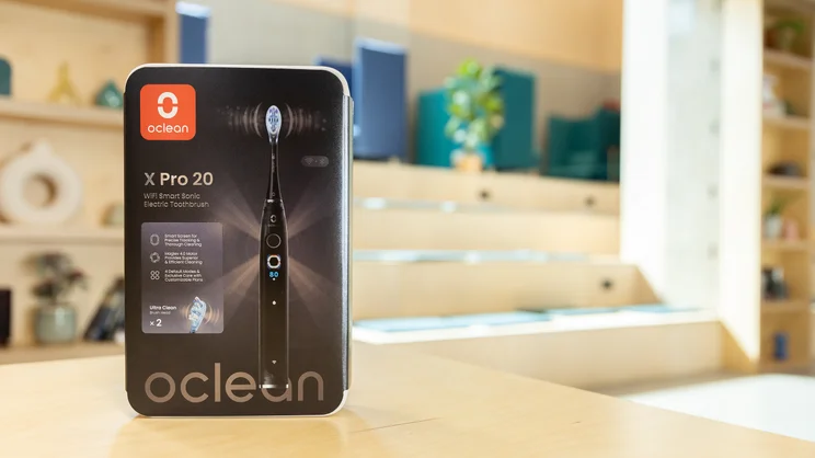The Oclean X Pro 20 sonic toothbrush box, on a table in an office