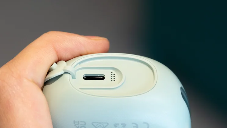 A close up of the Oclean AirPump A10 Water Flosser's charging port