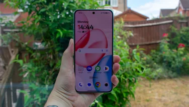 OnePlus Nord 5 in hand with the display on