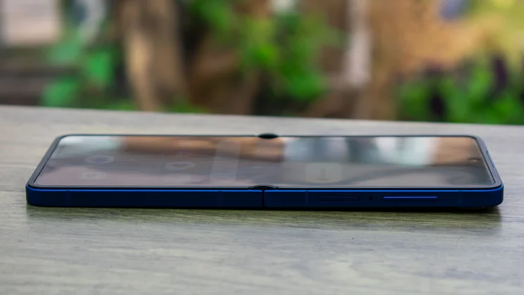 Samsung Galaxy Z Flip 7 unfolded on a desk, face up