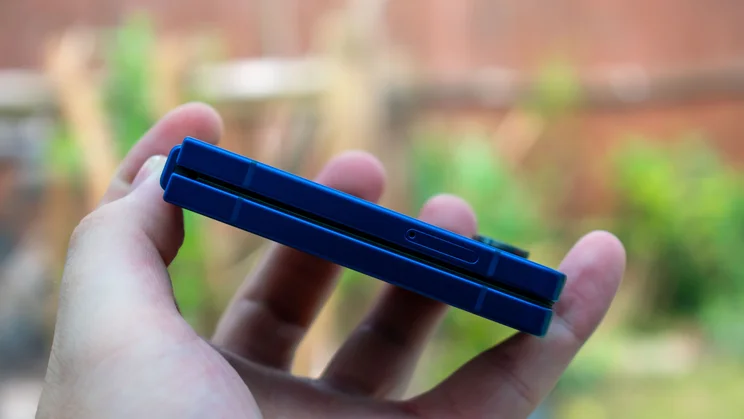 Samsung Galaxy Z Flip 7 folded in hand, angled view