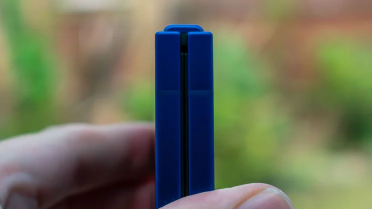 Samsung Galaxy Z Flip 7 folded in hand, close up on the hinge
