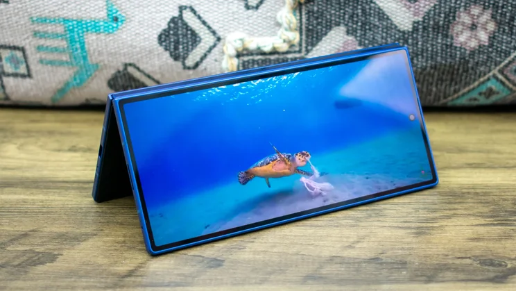 Samsung Galaxy Z Fold 7 folded in tent mode, showing an underwater scene on the cover display