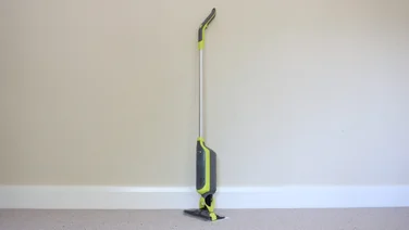 The Shark VacMop VM200UK in the middle of a room against a wall