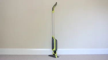 The Shark VacMop VM200UK in the middle of a room against a wall