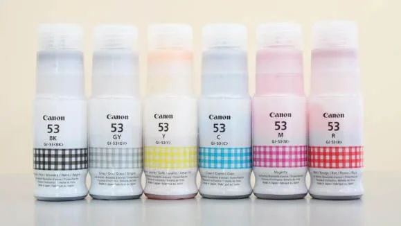 A selection of ink bottles containing the ink used by the Canon Pixma G650 ink tank printer