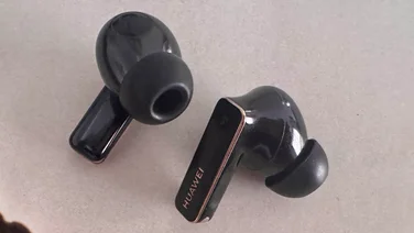 The Huawei FreeBuds 4 Pro wireless earbuds on a white table