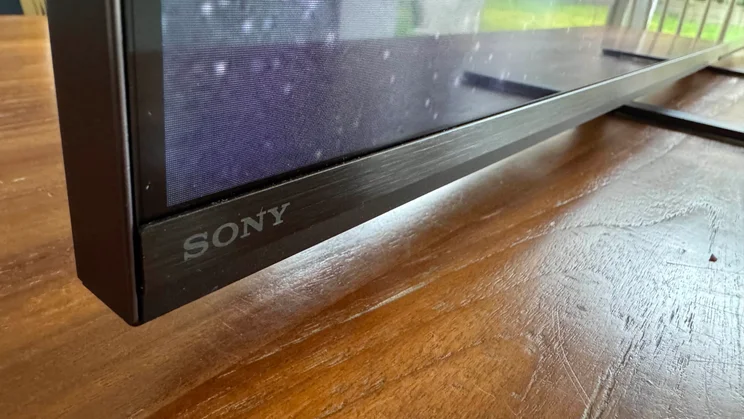 Close-up of the Sony logo on the bottom-left front corner of the Sony Bravia 9 Mini LED