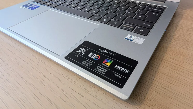 A photo of the front right corner of the Acer Aspire AI 14