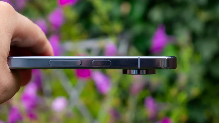 Google Pixel 10 Pro XL in hand, showing the power and volume buttons