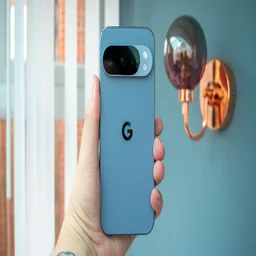 Google Pixel 10 Pro in hand, rear view