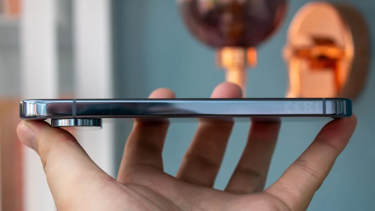 Google Pixel 10 Pro in hand, side view
