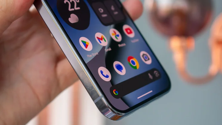 Google Pixel 10 Pro in hand, angled view