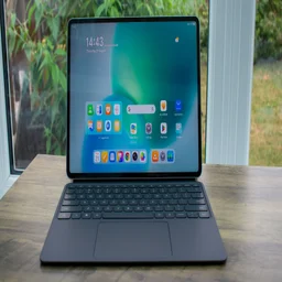 Honor Magic Pad 3 with keyboard case attached, on a desk