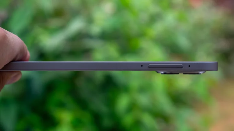 Honor Magic Pad 3 in hand, showing the side edge
