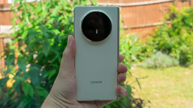 Honor Magic V5 in hand, folded, rear view