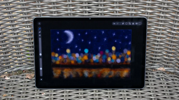 Huawei MatePad 11.5 (2025) propped on a chair with a drawing on the display