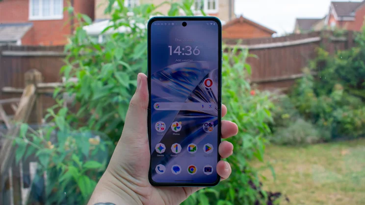 Motorola Razr 60 unfolded in hand, front view with the display on