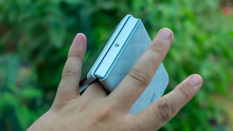 Motorola Razr 60 folded over a finger