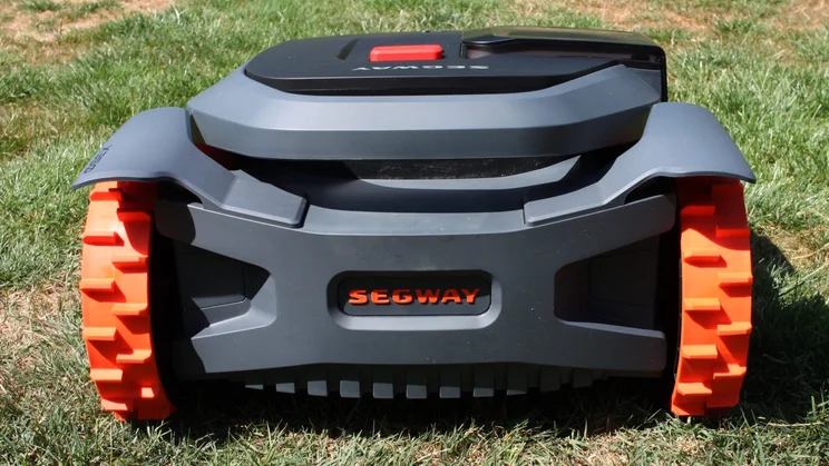 The Segway Navimow X350E, sitting on a lawn, from the rear