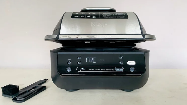 The Ninja 5-in-1 Grill & Air Fryer on a countertop