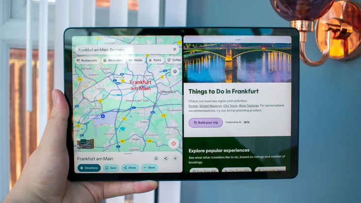 OnePlus Pad Lite in hand, display showing the split-screen feature