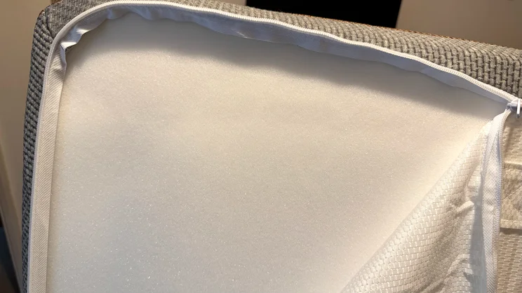 The REM-Fit 600 Lux Elite mattress unzipped, showing its foam underneath