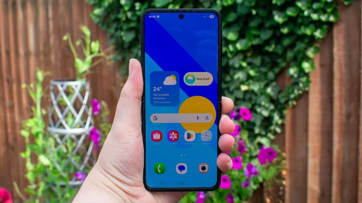 Galaxy Z Flip 7 FE unfolded in hand, display on