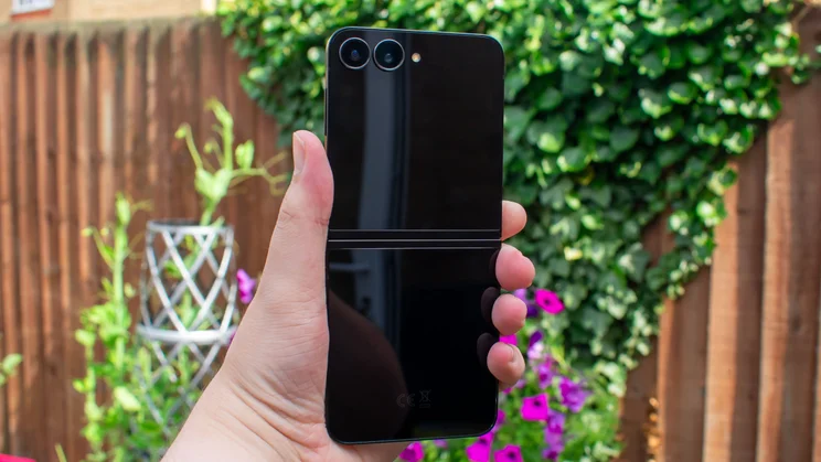 Galaxy Z Flip 7 FE unfolded in hand, rear view