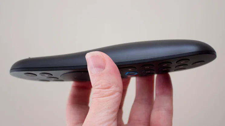 A close up view of the side of the Sky Glass Air remote control, held upside down