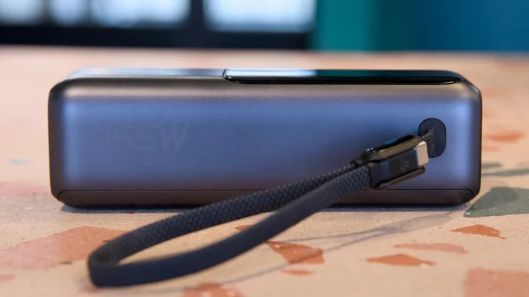 The Anker laptop power bank A1695 lying on its back, pictured from the righ side