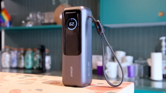 The Anker laptop power bank A1695 pictured standing on a worktop