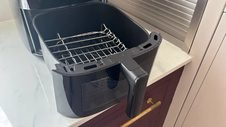 The Bosch Series 6 Air Fryer on a kitchen worktop, pictured with its grill in place