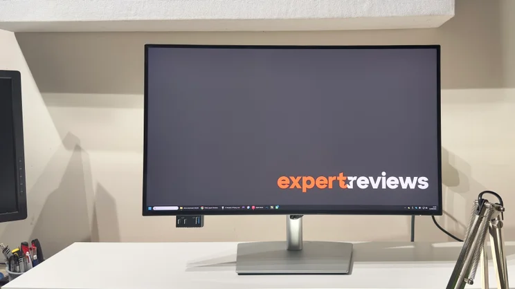 The Dell UltraSharp U2725QE, pictured on a desk from the front