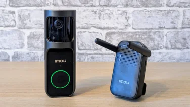 The Imou Doorbell 2S with its chime on a wood surface