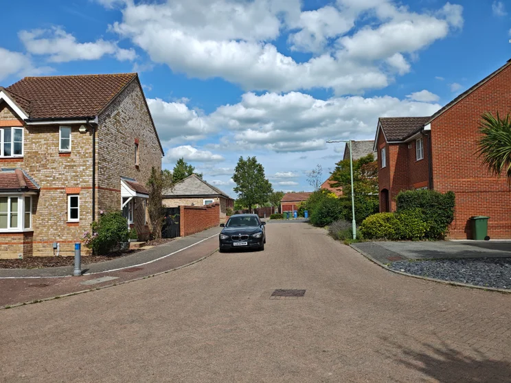 A quiet street with houses on both sides