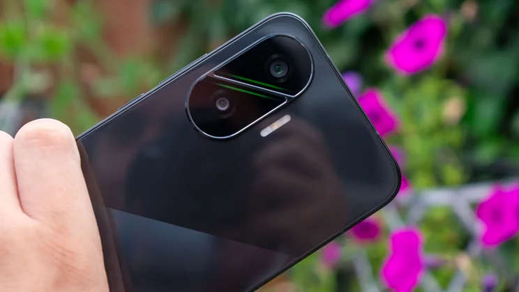 Xiaomi Poco F7 in hand, close up of the rear cameras