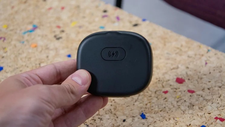 The rear of the JLab Epic Open Sport's charging case showing the wireless charging section