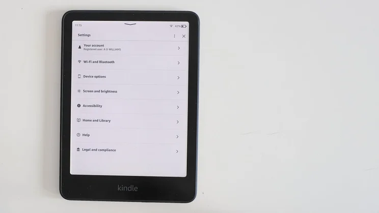 The Amazon Kindle Colorsoft against a white background, showing general settings