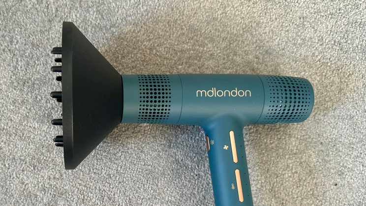 mdlondon Blow 2025 - product shot from above, lying on its side with diffuser nozzle attached
