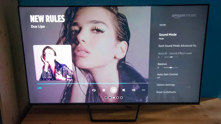 The sound option menu available on the Panasonic W95B Mini LED TV with Dua Lipa album art displayed on screen