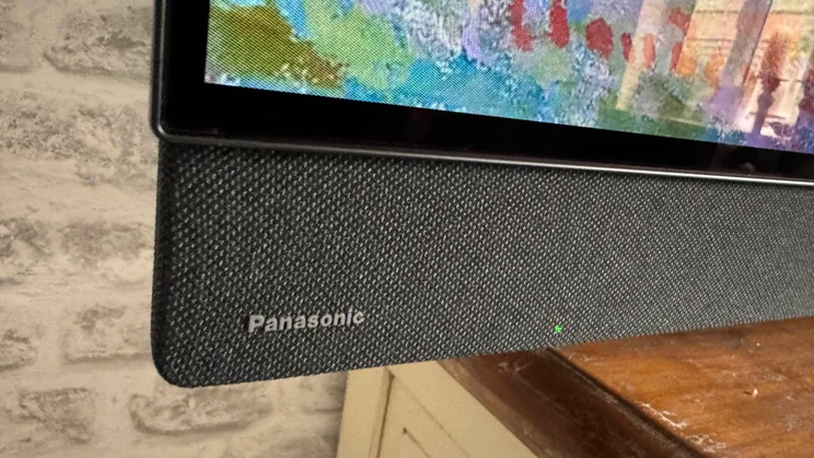 The Panasonic logo on the front-firing speaker of the Panasonic Z95B OLED TV