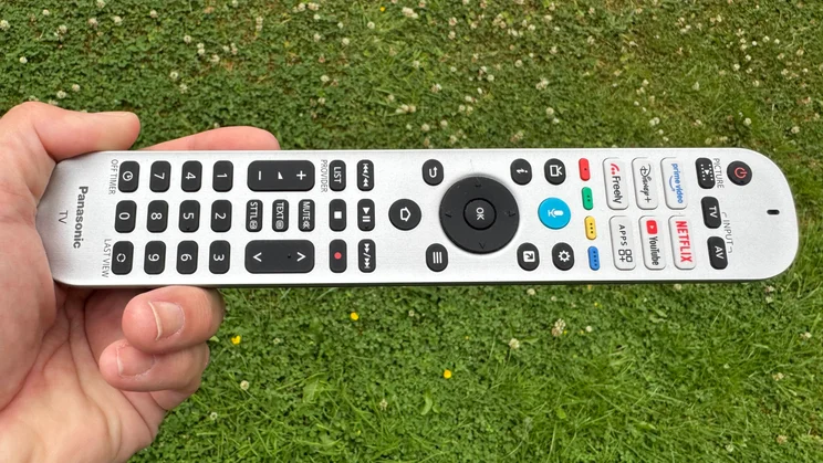 The silver remote control included with the Panasonic Z95B OLED TV