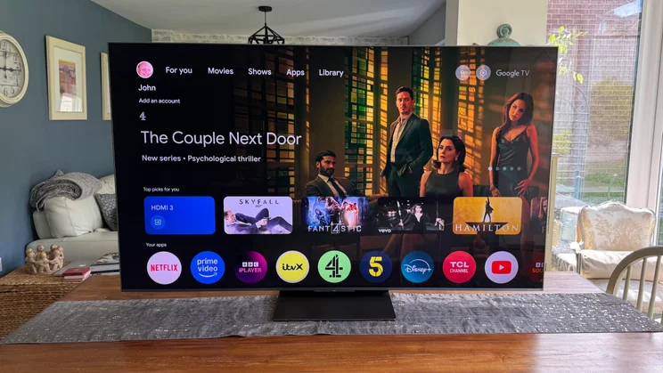 The Google TV smart platform home page displaying on the screen of the TCL C8K QD-Mini LED TV